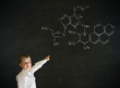 Pointing boy business man with science chemistry formula