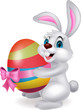 Cute rabbit carftoon holding easter egg