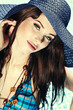 Photo: Pretty woman in white bikini floating in swimming pool Pretty woman in white bikini floating in swimming pool