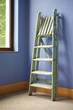 Home improvement with ladder and blue wall