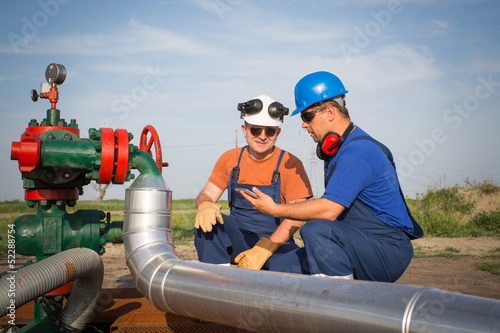Photo: Oil workers Oil workers