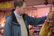 Man selecting a jamon