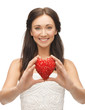 woman showing heart shape