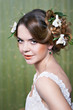Portrait beautiful bride with flowers in hair
