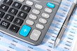 Calculator and pen.