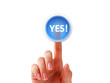 Female hand pressing button.