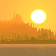 Illustration of big arab city by sea at sunset.