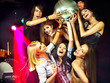 Photo: Woman on disco in night club. Woman on disco in night club.