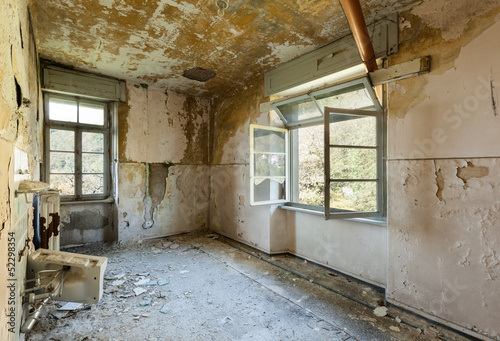 Photo: old destroyed building, room with window old destroyed building, room with window