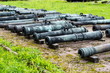 Old vintage Russian artillery systems and equipment on grass