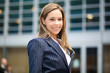 Successful young businesswoman in an urban setting