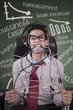 Photo: Stress businessman tied in rope at class - vertical Stress businessman tied in rope at class - vertical