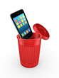 Modern mobile phone in recycle bin.