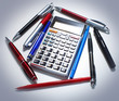 Foto: Calculator and pen. Stationery objects. Calculator and pen. Stationery objects.