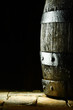 Old oak barrel on flagstones
