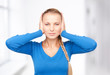 woman with hands on ears