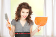 Photo: beautiful woman with cleaning sweep beautiful woman with cleaning sweep
