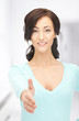 Photo: woman with an open hand ready for handshake woman with an open hand ready for handshake