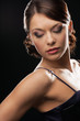 woman with diamond earrings