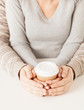 woman and man with take away coffee cup