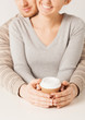woman and man with take away coffee cup