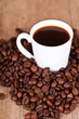 Photo: cup of coffee and beans cup of coffee and beans
