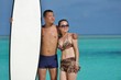 Photo: happy young couple enjoying summer on beach happy young couple enjoying summer on beach