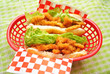 Two Clam Rolls Over a Green Background