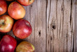 apples on wooden plank