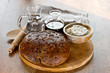 Photo: bread on wooden board with oil and wather bread on wooden board with oil and wather