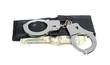 Foto: Black leather wallet with handcuffs, clipping path included. Black leather wallet with handcuffs, clipping path included.