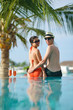 Photo: happy young couple have fun on beach happy young couple have fun on beach