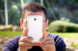 Man Taking Pictures With Smartphone