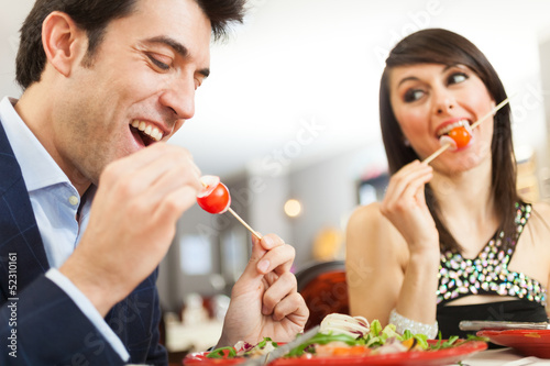 Photo: Couple having dinner Couple having dinner