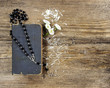 the Bible and a rosary