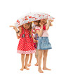 Foto: Barefoot children under an umbrella Barefoot children under an umbrella