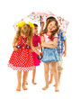Foto: Barefoot children under an umbrella Barefoot children under an umbrella