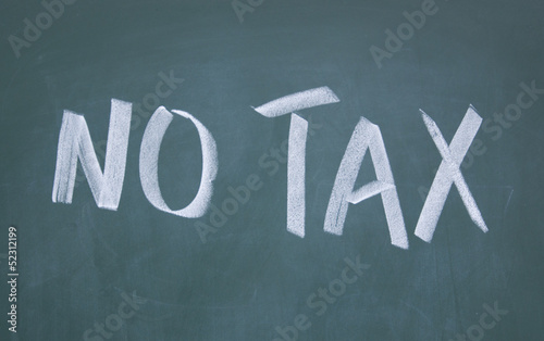 Photo: no tax title written with chalk on blackboard no tax title written with chalk on blackboard