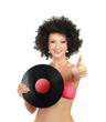 Photo: woman in afro wig holding vinil disc woman in afro wig holding vinil disc