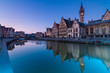Foto: Leie river bank in Ghent, Belgium, Europe. Leie river bank in Ghent, Belgium, Europe.