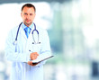 Foto: portrait of doctor in white coat and stethoscope portrait of doctor in white coat and stethoscope