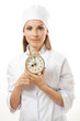 medical female doctor holding alarm clock,  isolated on white