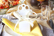 Wedding table cutlery and gift box on plate background concept