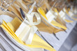 Wedding table cutlery and gift box on plate background concept