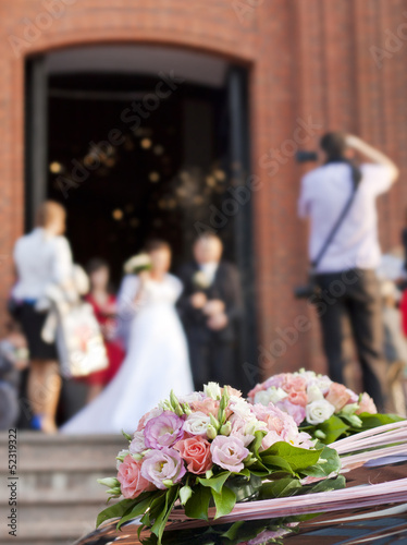 Photo: Bride and groom at church background concept Bride and groom at church background concept