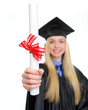 Closeup on diploma in hand of young woman in graduation gown