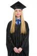 Portrait of young woman in graduation gown