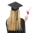 Woman in graduation gown with diploma. rear view