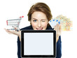 Photo: Business woman shopping on the internet with tablet pc Business woman shopping on the internet with tablet pc