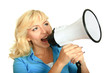 portrait of young girl shouting with megaphone